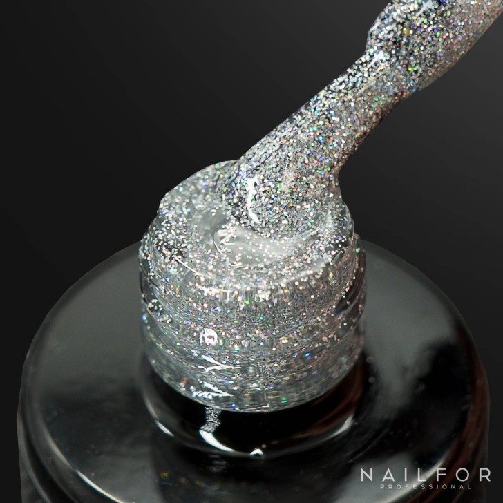 Vernis à ongles semi-permanent couleur : Fantasy Vernis Gel Semi-permanent - 301 argent avec microglitter arc-en-ciel Nailfor ..